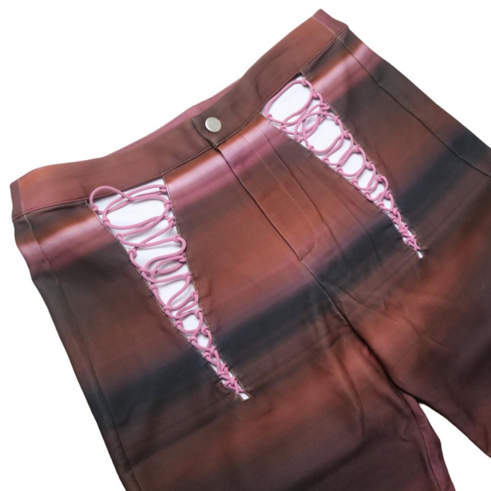 The Kript cut out lace up abstract striped print pants